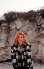 beautiful young woman having fun and smiling in open air