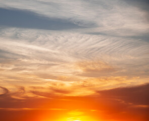 Naklejka na ściany i meble Sunset in with dramatic storm clouds.