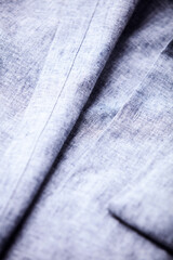 Close up of men's linen shirt. Soft focus.	