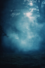 A forest with a blue sky and a tree in the background