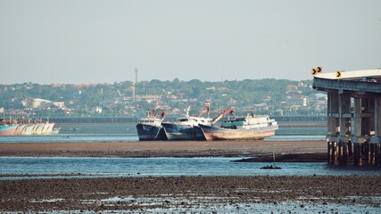 several boats were stranded when the sea water receded
