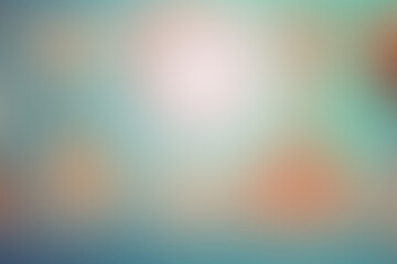Blurred background with gradient blue, brown and white.