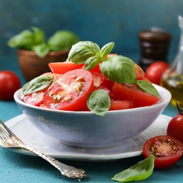 tomato salad with basil leaves