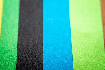 Extreme macro of multicolor background from different colors papers