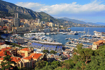 Fototapeta na wymiar Monaco. Top view of Monte Carlo and the port located on the shores of the Ligurian Sea.