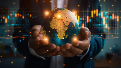 Businessman holding a glowing globe with digital charts and graphs projected on background with important business information over global network connection technology. - obrazy, fototapety, plakaty