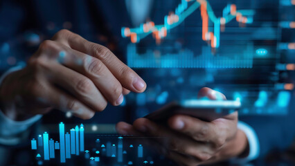 Businessman using a smartphone with digital charts and stock graphs projected on smartphone shows trends and data for business over global network connection.