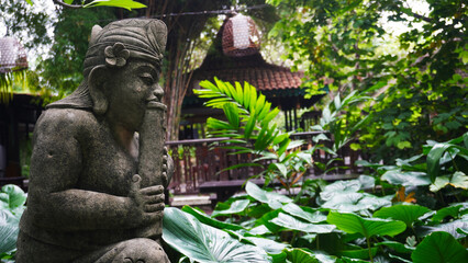 Calm quite Public park with statue on huge old tree. Greenery environment suitable for relaxation...