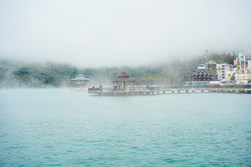 Sun Moon Lake，Nantou, Taiwan, Republic of China, 01 22 2024: The landscape of Sun Moon Lake in a cloudy and foggy day