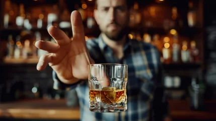 Foto op Canvas man refuses say no and avoid to drink an alcohol whiskey , stopping hand sign male, alcoholism treatment, alcohol addiction, quit booze, Stop Drinking Alcohol. Refuse Glass liquor, unhealthy, reject © pinkrabbit