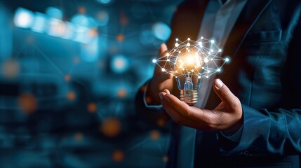 Businessman holding a light bulb in his hands, symbol of a new innovative idea of business technology, financial marketing network, profit planning strategy, developing analytical solutions