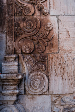 Ornamental detail of the main entrance door to the church of Santa Maria de Moia or the Mare de Deu de la Misericordia, parish church in the town of Moia, in Cataliña (Spain)