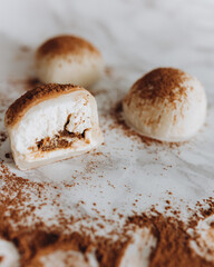 A popular Japanese dessert made from rice flour and cream filling - mochi