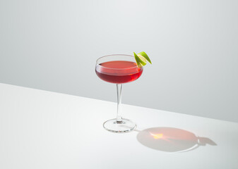 Cosmopolitan Cocktail on table with white background