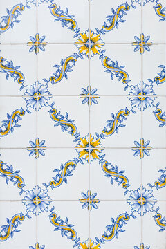 Flower inspired mosaic of tiles original from Portugal using blue and yellows