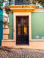 San Juan, Puerto Rico - March 26, 2024: Rustic building entrances and doors along the side streets in the old town of San Juan, Puerto Rico
