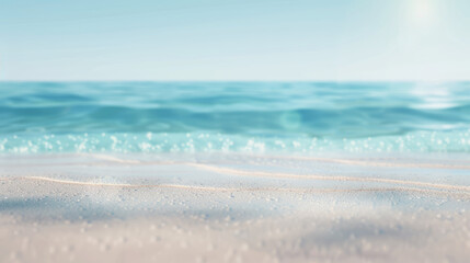 Simple, blurry background of a sandy beach and calm sea.