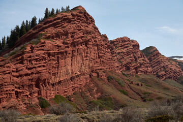 Red rocks sandstone cliff, gorge Jety-Oguz. Popular touristic location, travel destination place...