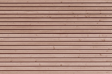 brown wooden wall with horizontal boards and wood grain