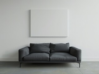 Gray couch in front of white wall