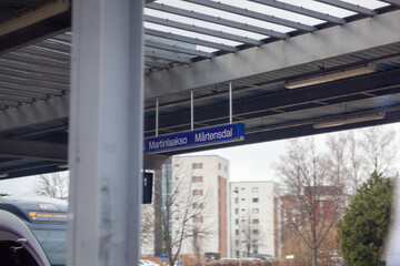 Martinlaakso tarin station sign. Photographed from the train.
