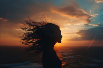 Silhouetted Female Figure Against Dramatic Sky