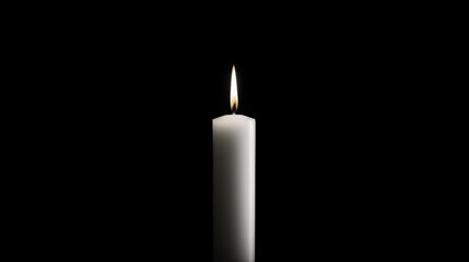one white color pillar candle burning on black background
