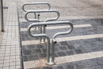 Bicycle rack bollards closeup in city street