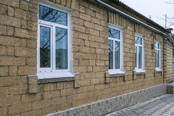 Natural stone from sedimentary rocks is used for the construction of houses.Dagestan stone.The masonry walls of the house are made of blocks of natural stone.Environmentally friendly building material