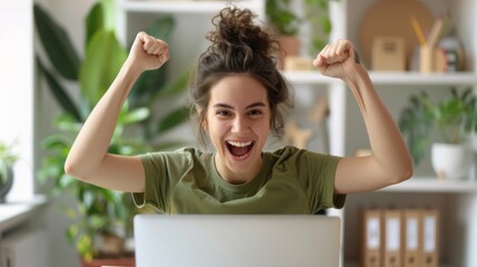 Joyous Woman Celebrating at Laptop