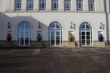 Luxembourg City, Luxembourg. 31-03-2024. 4 coloured vases in front of the Superior Court of Justice building. - obrazy, fototapety, plakaty