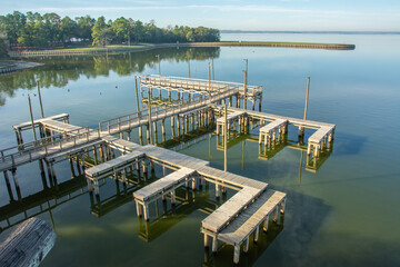 View of the boardwalk pier on Lake Livingston reservoir located in the East Texas Piney Woods in Polk County, Texas, United States