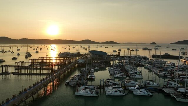 View of the bay with boats, dawn, aerial video from a drone