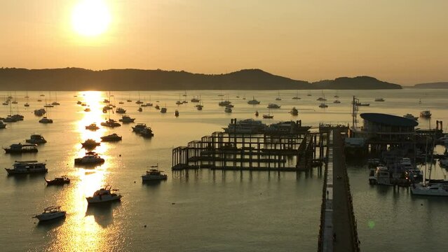 View of the bay with boats, dawn, aerial video from a drone
