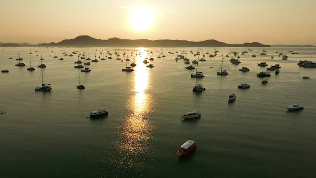 View of the bay with boats, dawn, aerial video from a drone