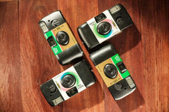 Top down shot background of Fujifilm disposable camera on floor