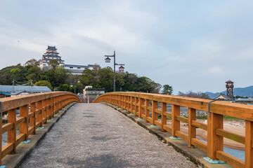 Karatsu castle from Jyounai bridge in city at sunset, Saga, Japan