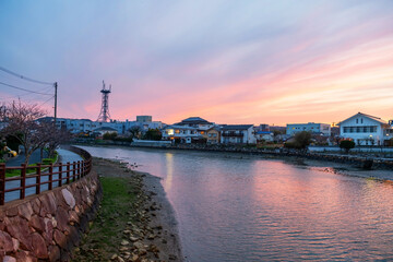 Japanese houses by Matsuura river with twilight sky at dusk, Saga