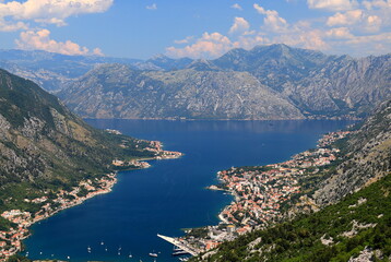 Fototapeta na wymiar high mountains in Montenegro. Beautiful Kotor Bay and old city Kotor in summer. Full top view boka kotorska