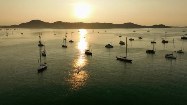 View of the bay with boats, dawn, aerial video from a drone