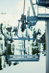 Fototapeta premium An empty chairlift in the spring