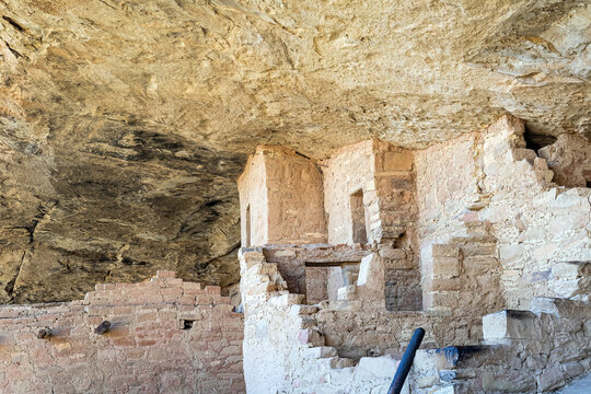 Ancient Pueblo cliff dwelling in Mesa Verde National Park during summer in Colorado, USA.