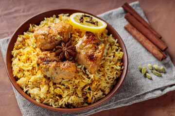 Indian Spiced Chicken Biryani with Star Anise, Cinnamon Sticks and Lemon, Trendy Indian and Pakistani Food
