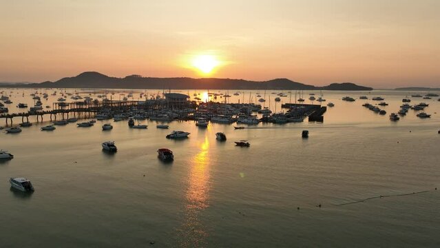 View of the bay with boats, dawn, aerial video from a drone