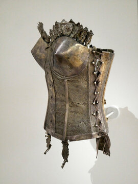 Metal and lace corset immersed in a silver bath. Ready to wear 1988-89 - Symbol of confinement in the past, Jean Paul Gaultier transcends it into a weapon of power