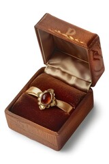 A luxurious gold ring with a vibrant red stone displayed in a wooden box. Ideal for jewelry or gift concepts