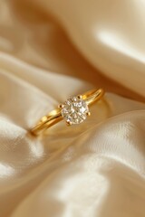 Fototapeta na wymiar Sparkling diamond ring displayed on a white cloth