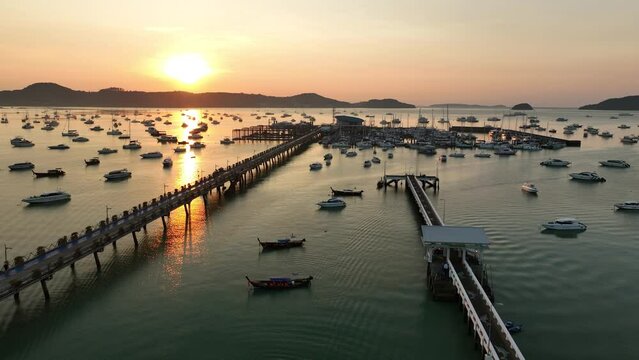 View of the bay with boats, dawn, aerial video from a drone