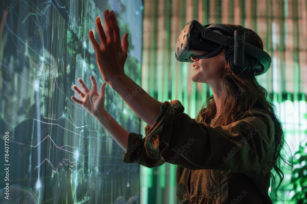Poster A woman wearing VR goggles is seemingly touching and interacting with virtual graphics