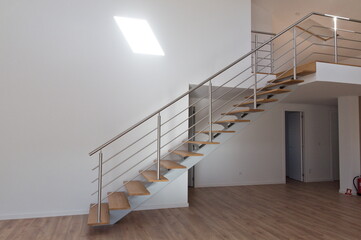modern wood stairs in the hollway in a big private house